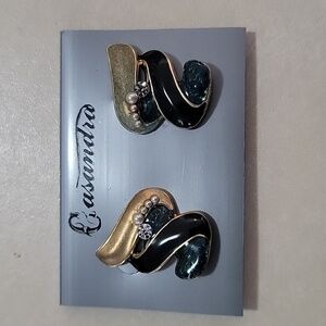 Vintage clip on black and gold tone earring